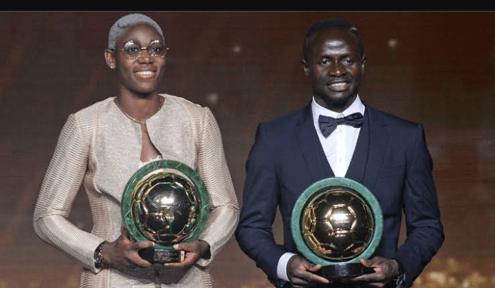 Oshoala and Mane with their POTY awards