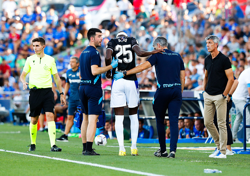 Sadiq Umar helped off the pitch at Real Sociedad due to an injury