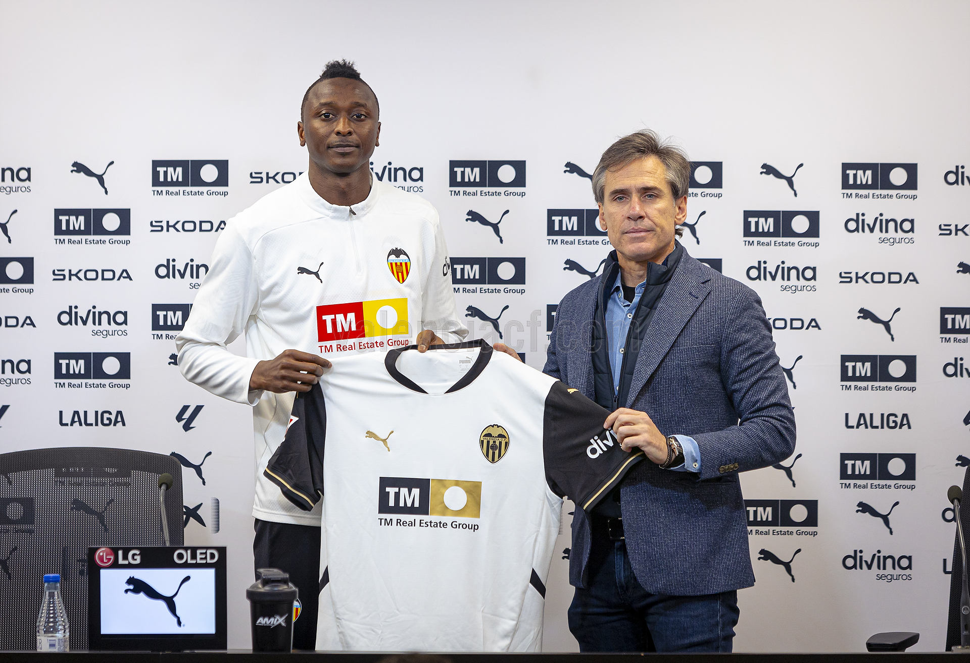Valencia's Sporting Director, Miguel Ángel Corrona alongside Super Eagles striker, Sadiq Umar. The striker was unveiled as a Valencia striker today at the Mestalla Stadium