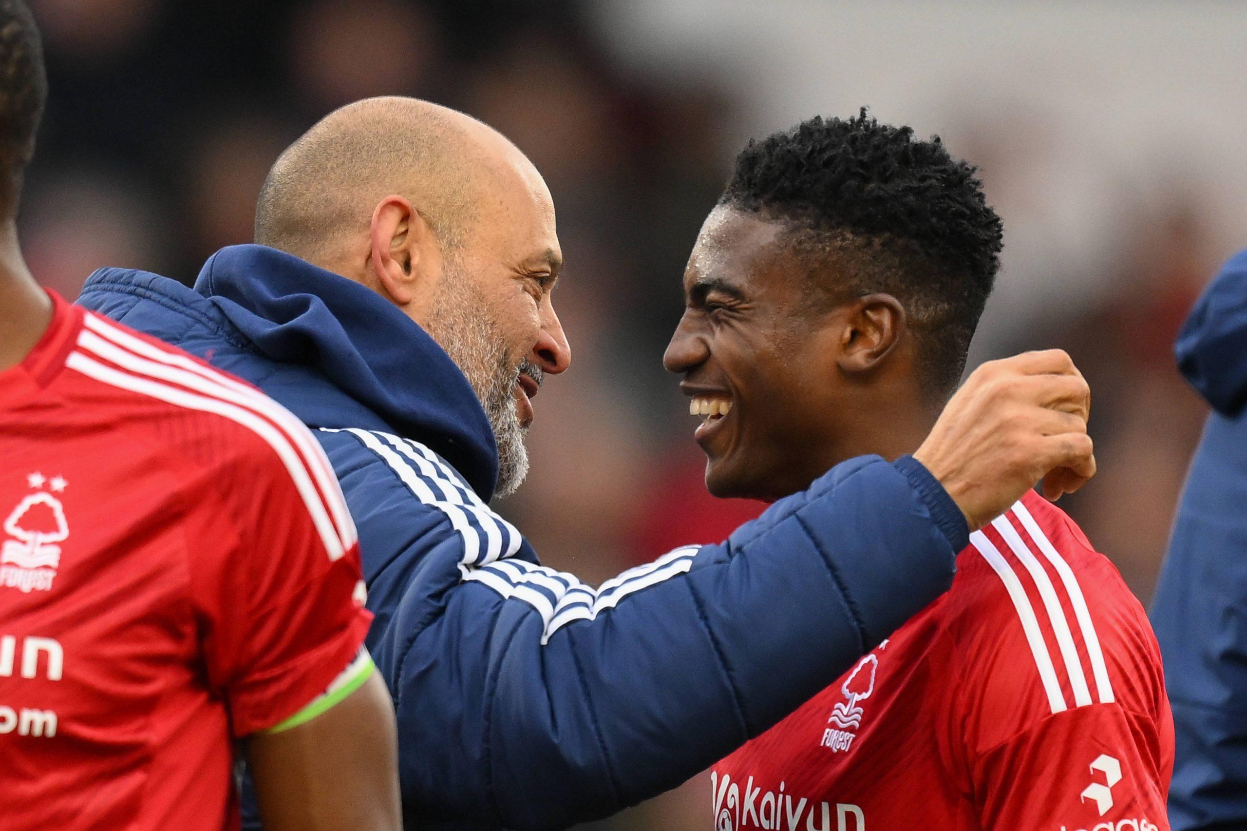 Nuno Espirito Santo, and Taiwo Awoniyi celebrate victory during the Premier League match between Nottingham Forest and Brighton and Hove Albion at the City Ground in Nottingham, England