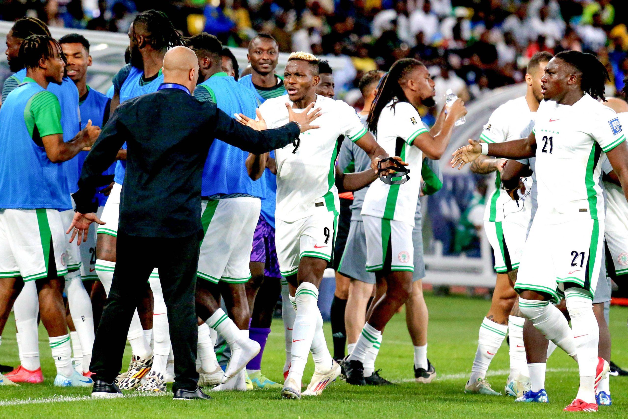 Nigeria vs Rwanda: Super Eagles star Osimhen celebrates with Coach Eric Chelle.