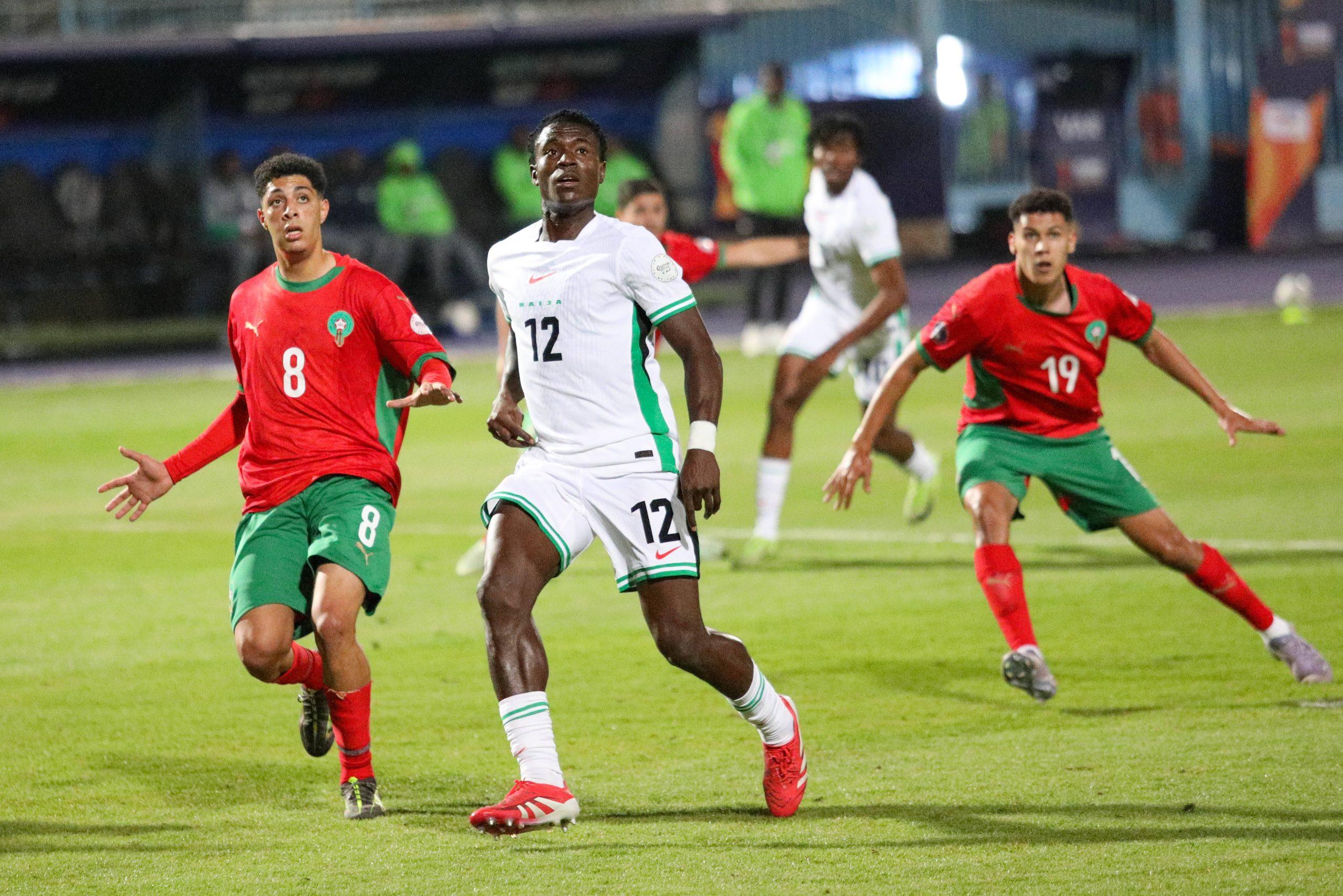 Ayman Arguigue of Morocco and Precious Benjamin of Nigeria