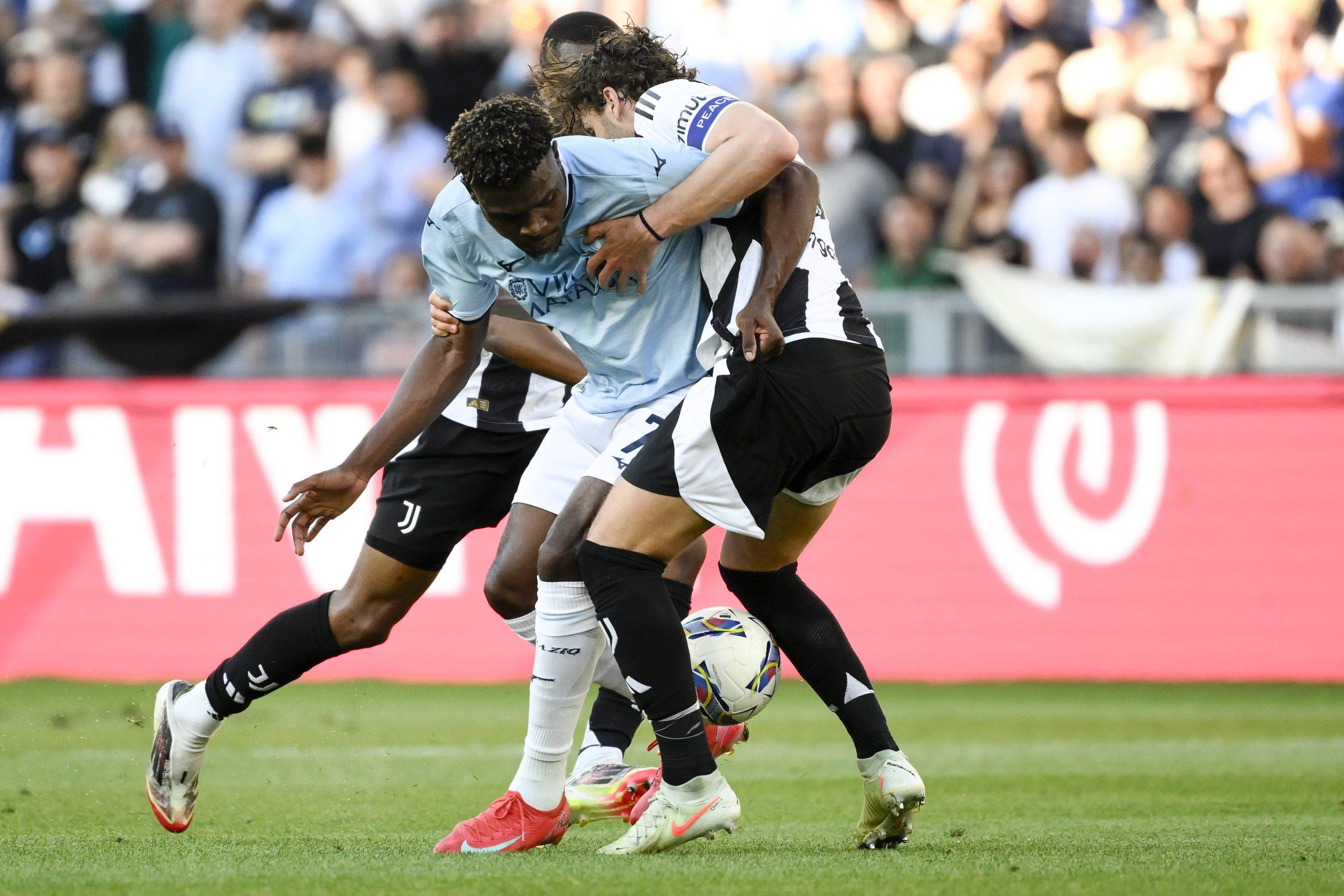 Manuel Locatelli of Juventus FC and Fisayo Dele-Bashiru of SS Lazio compete for the ball during the Serie A football match between SS Lazio and Juventus FC