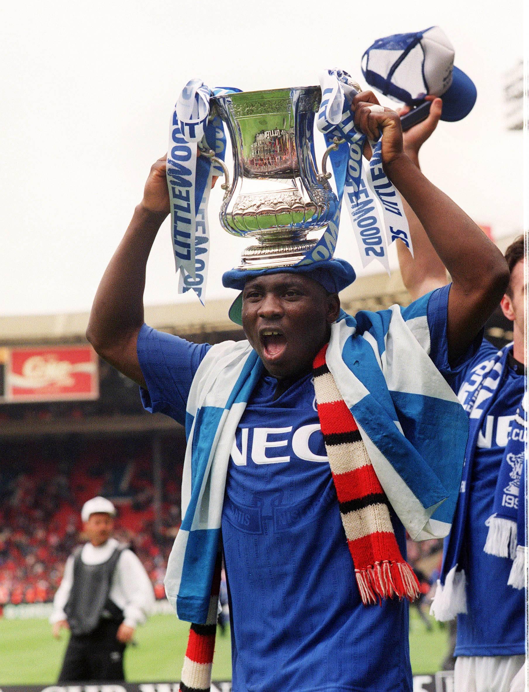 Nigeria legend Daniel Amokachi with the 1995 FA Cup trophy