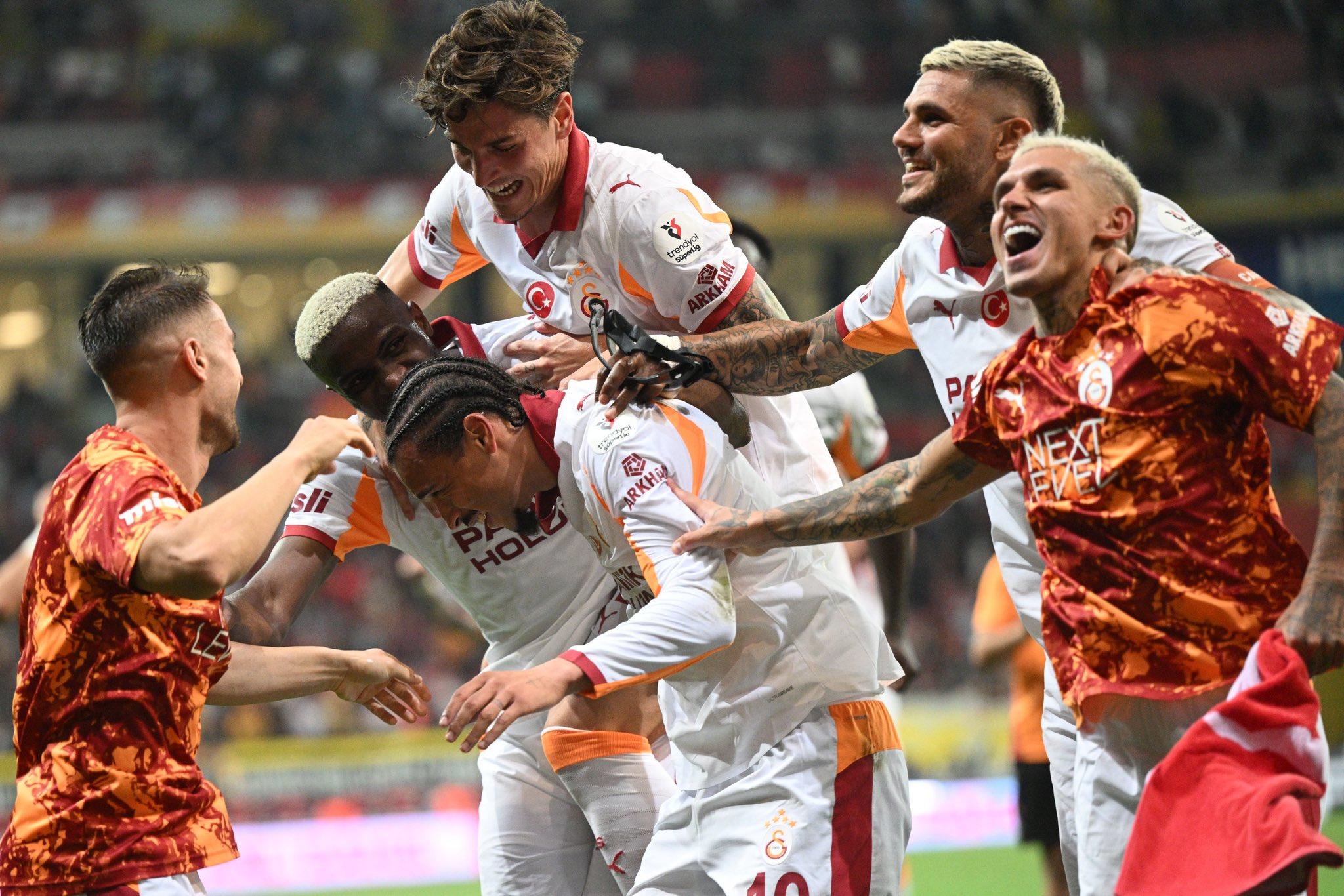 Nigeria and Galatasaray striker Victor Osimhen celebrates with club teammates