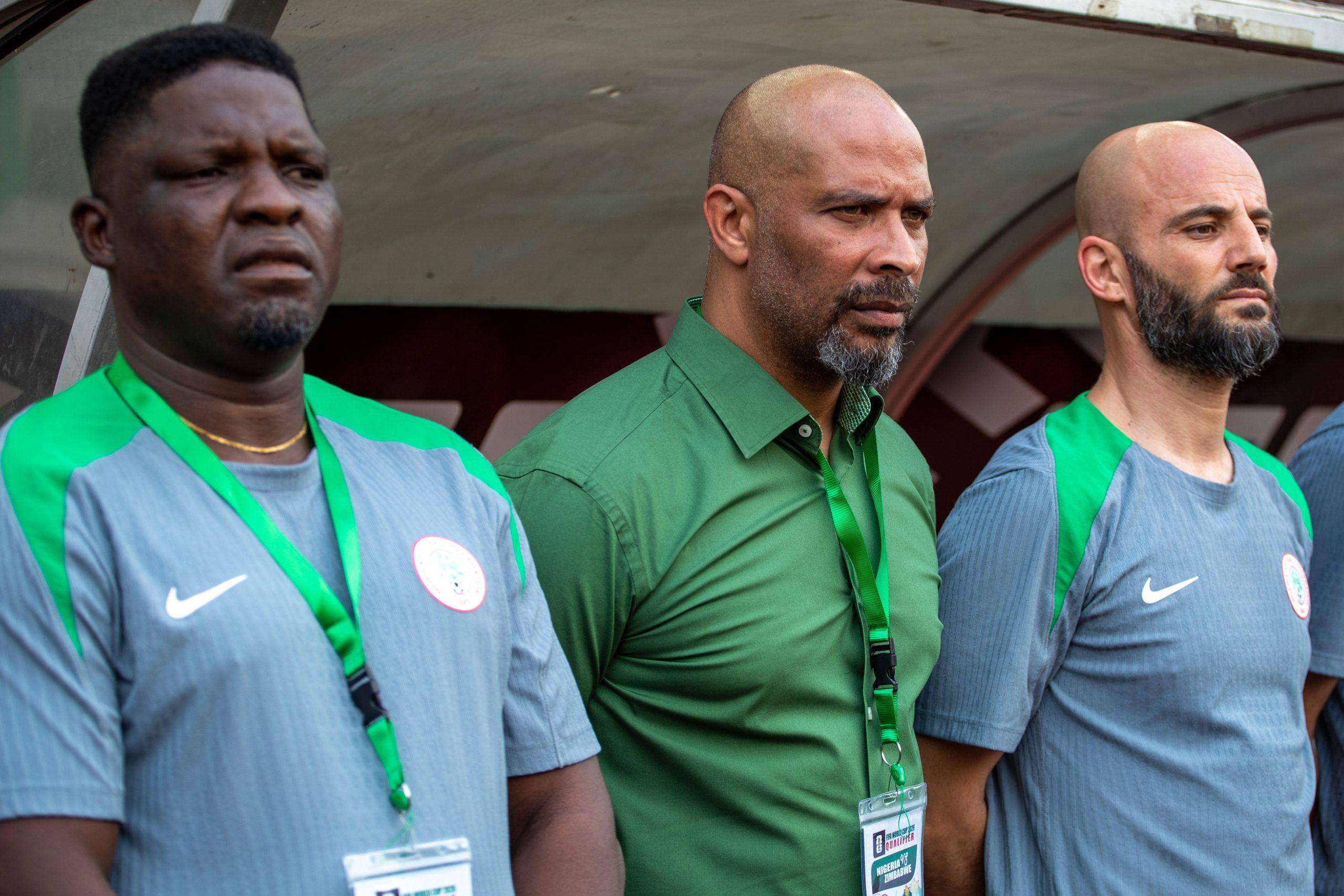 Daniel Ogunmodede, Eric Chelle and the other Super Eagles assistants on the bench