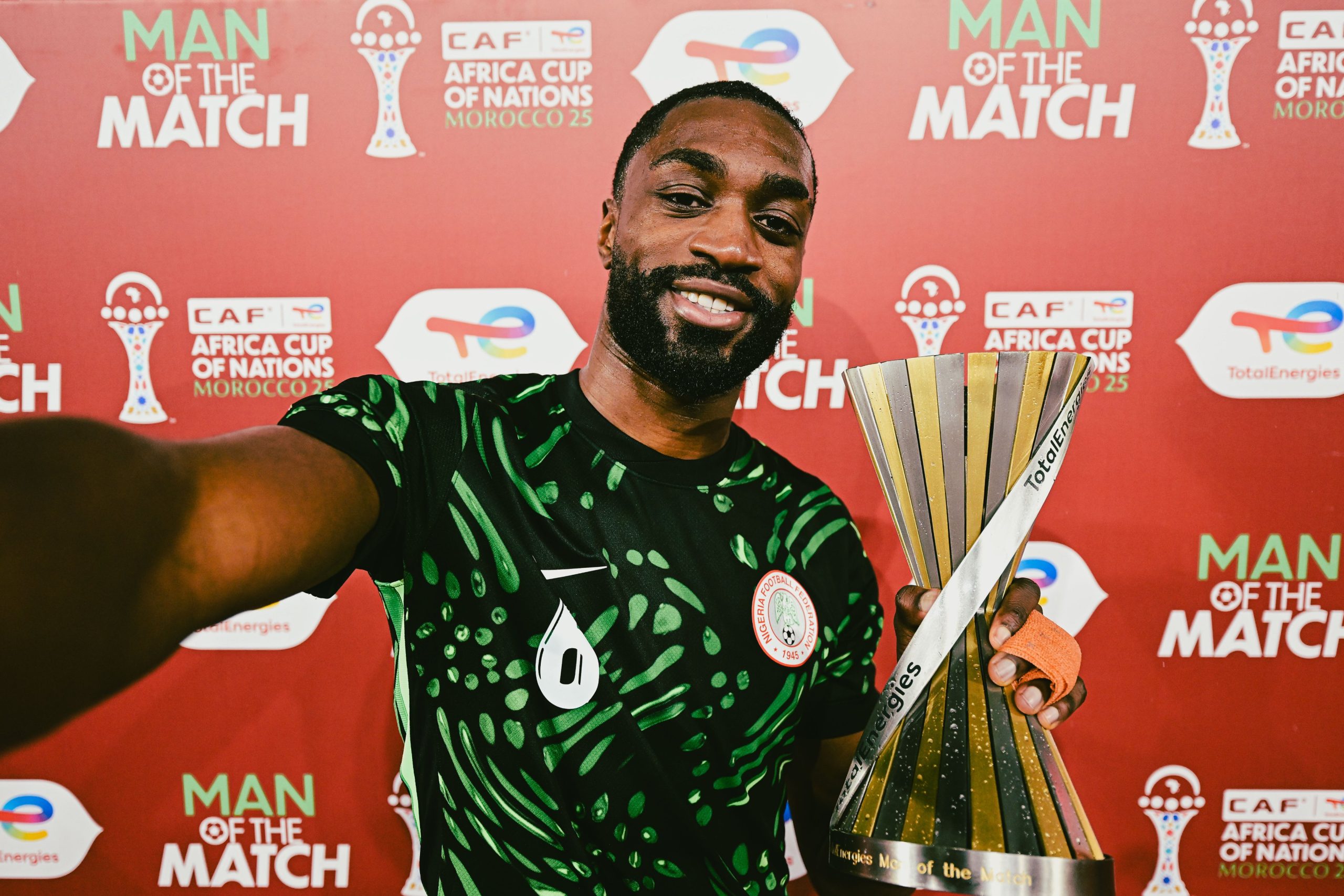 Semi Ajayi poses with his man of the match award after Nigeria's 2-1 win over Tanzania in their AFCON 2025 Group C opener