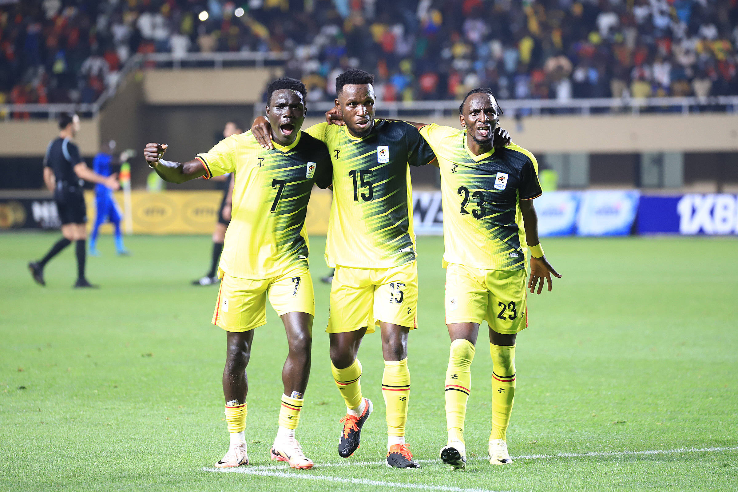 Aziz Abdu Kayondo R of Uganda celebrates with teammates