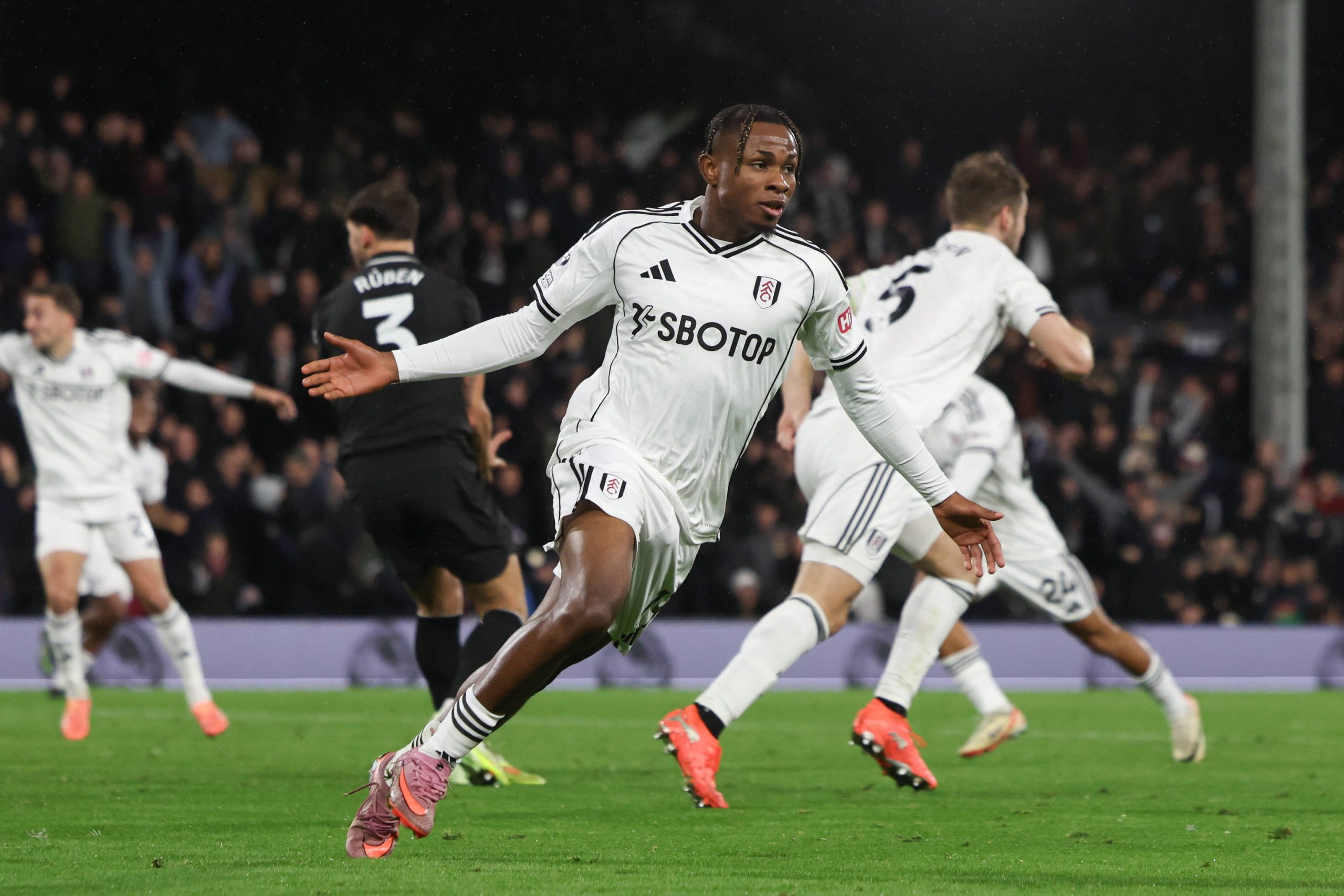 Samuel Chukwueze celebrates after scoring his second goal 4-5 during the Fulham v Manchester City