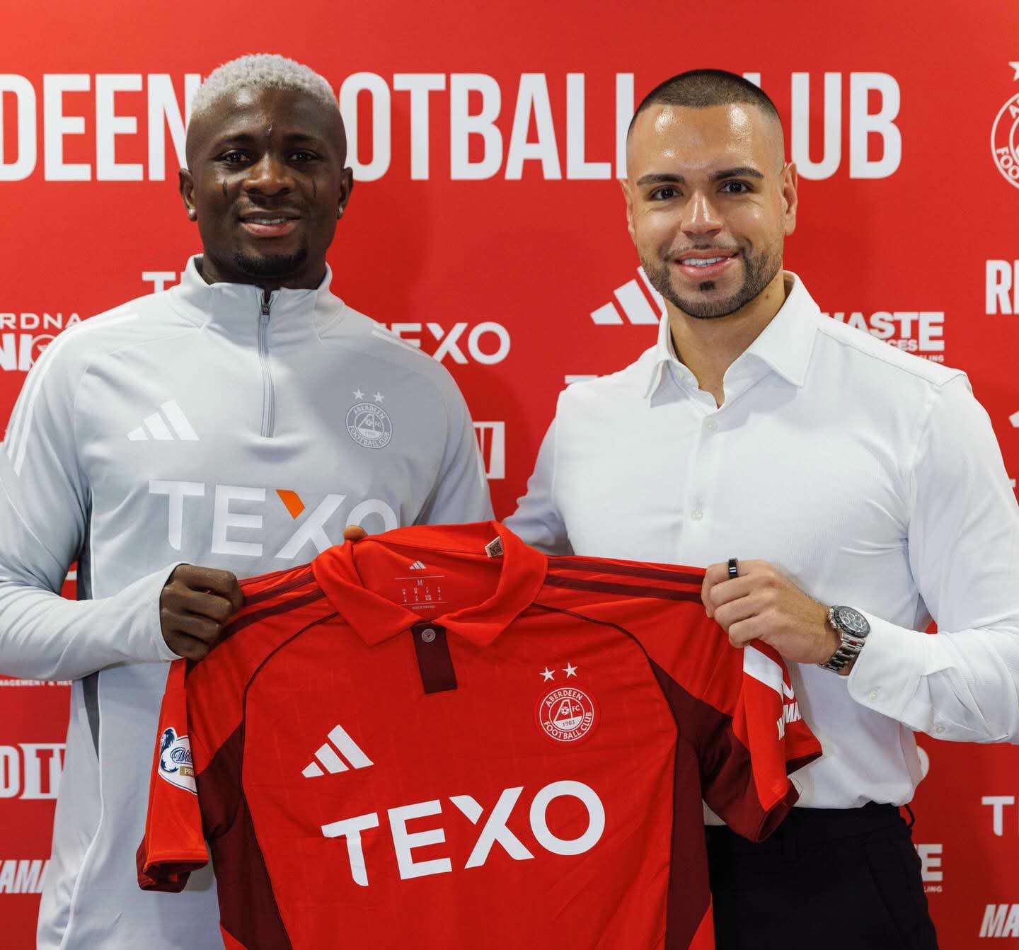 Afeez Aremu poses with Aberdeen shirt