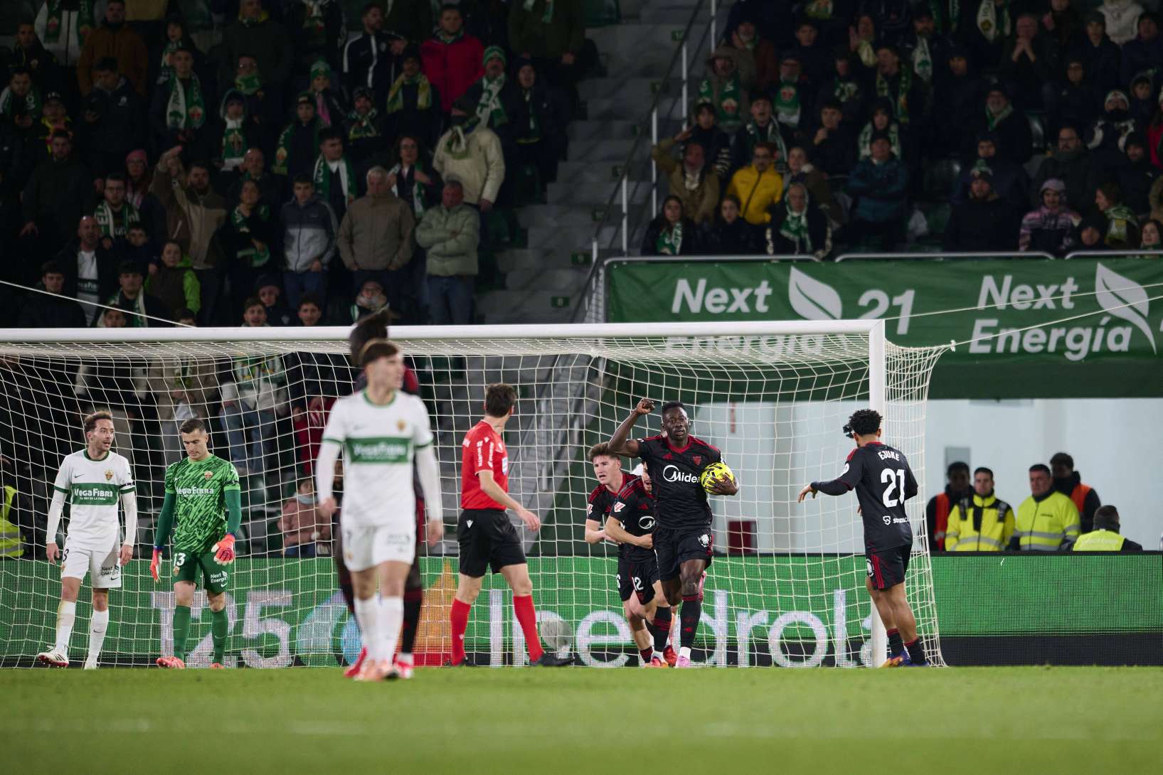 Akor Adams celebrates after scoring for Sevilla against Elche