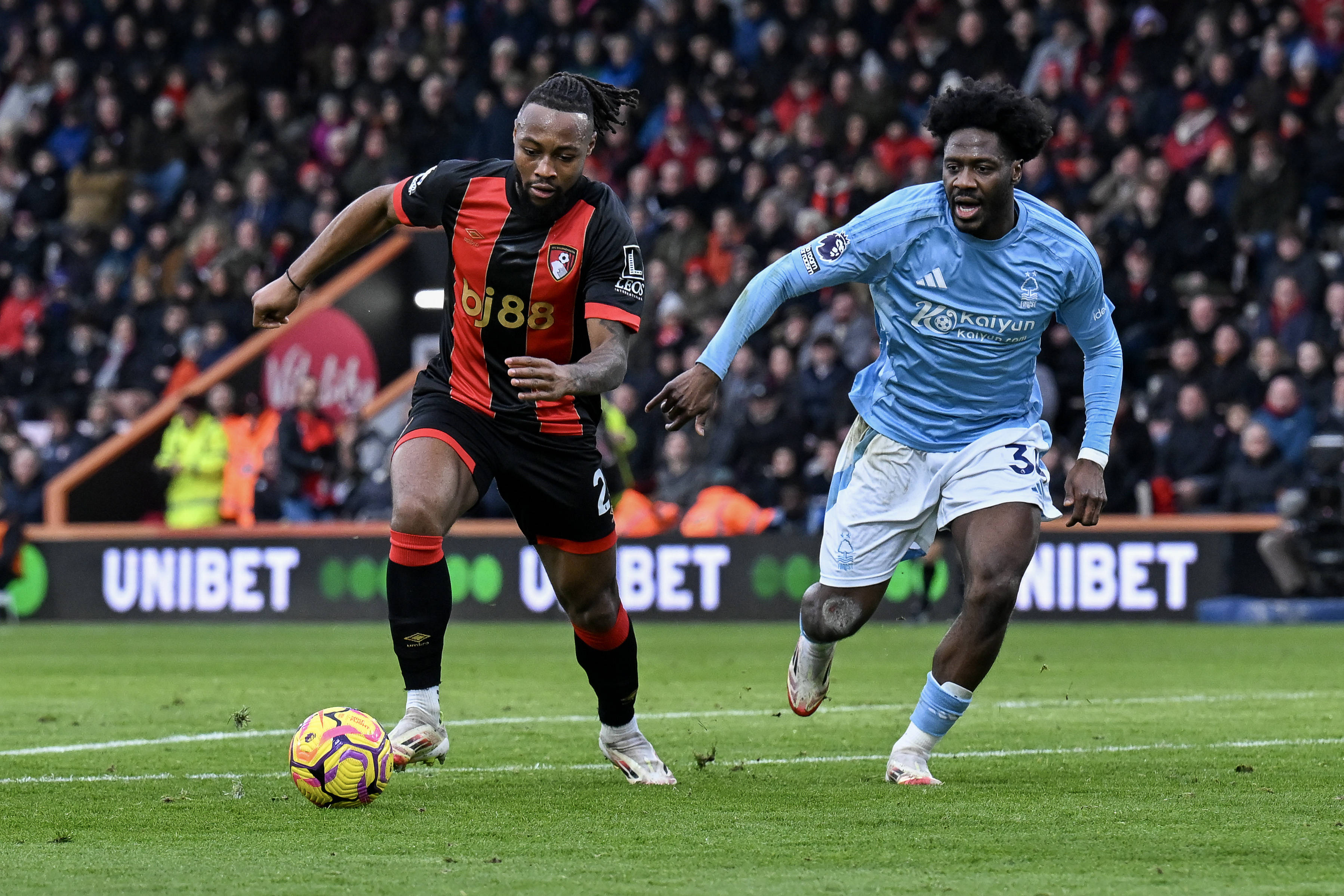 Antoine Semenyo tries to find a way past Ola Aina