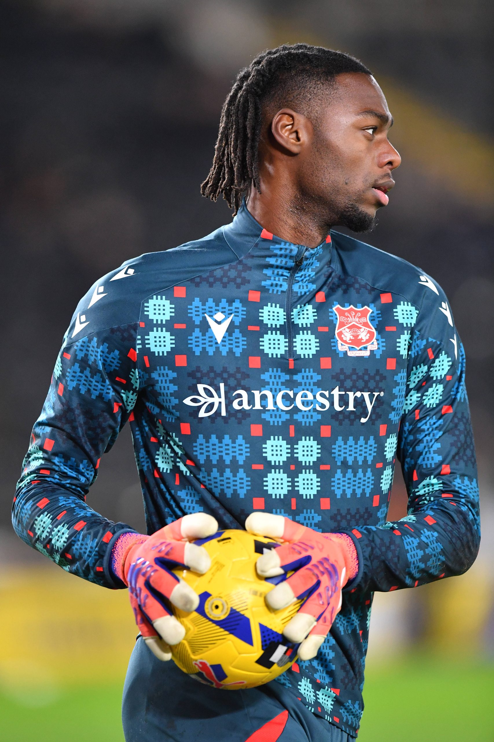 Arthur Okonkwo warms up before the EFL Sky Bet Championship match between Hull City and Wrexham FC