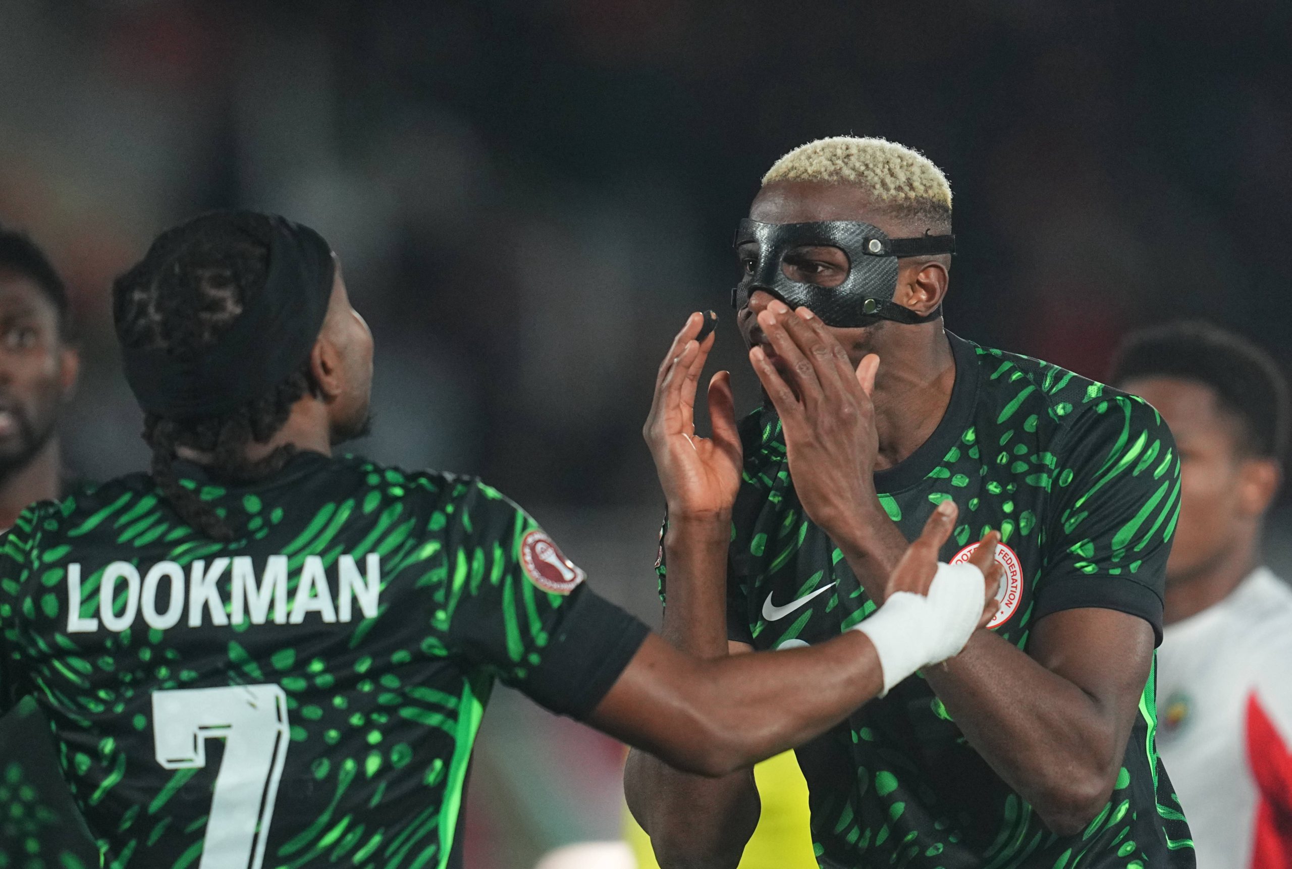 Victor Osimhen Nigeria and Ademola Olajide Lookman Nigeria gestures during the Africa Cup Of Nations match between Mozambique and Nigeria