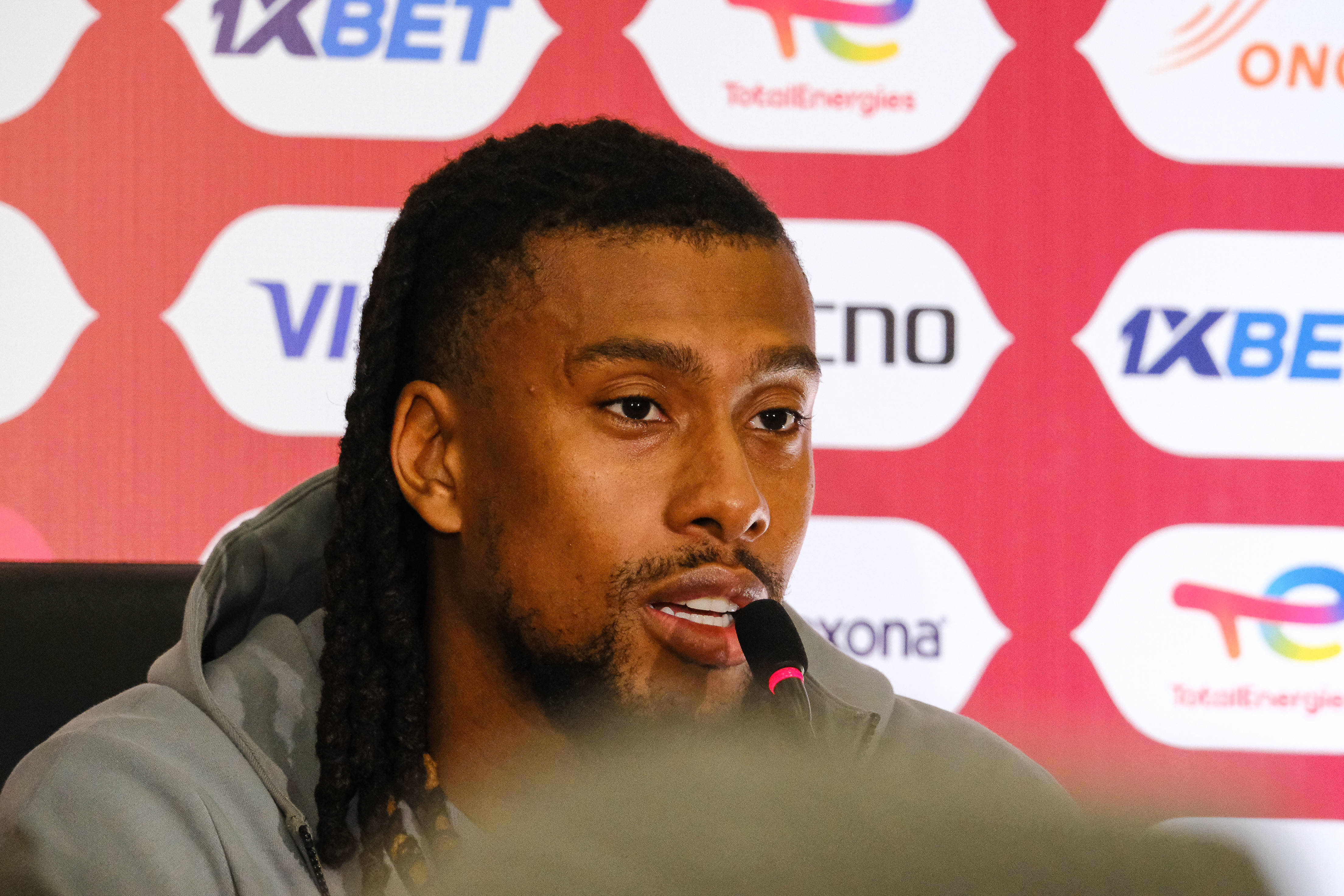 Alex Iwobi answers questions during a pre-match press conference at the Main Media Centre in Rabat