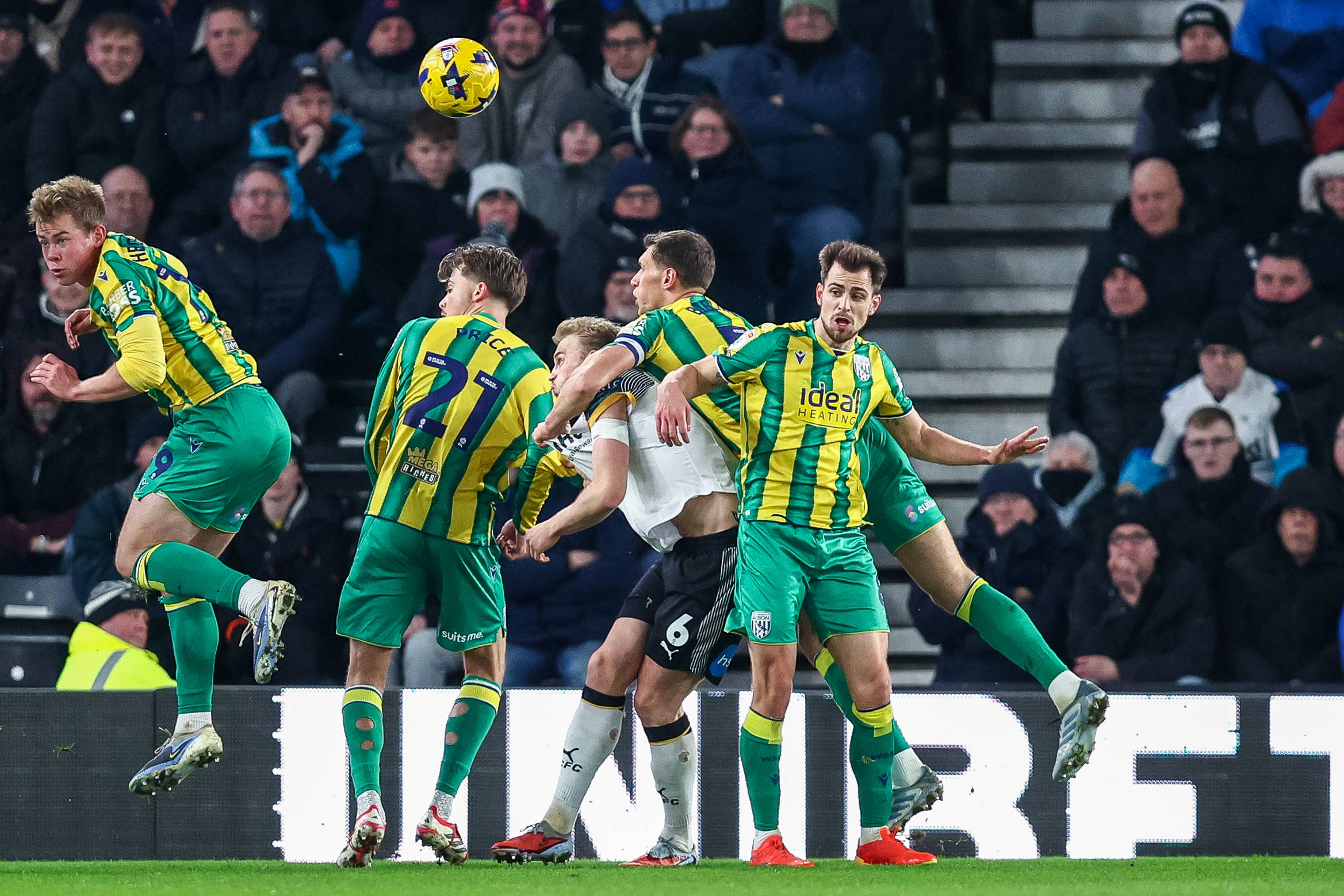 Sondre Langas of Derby County is in the midst of West Bromwich Albion defenders