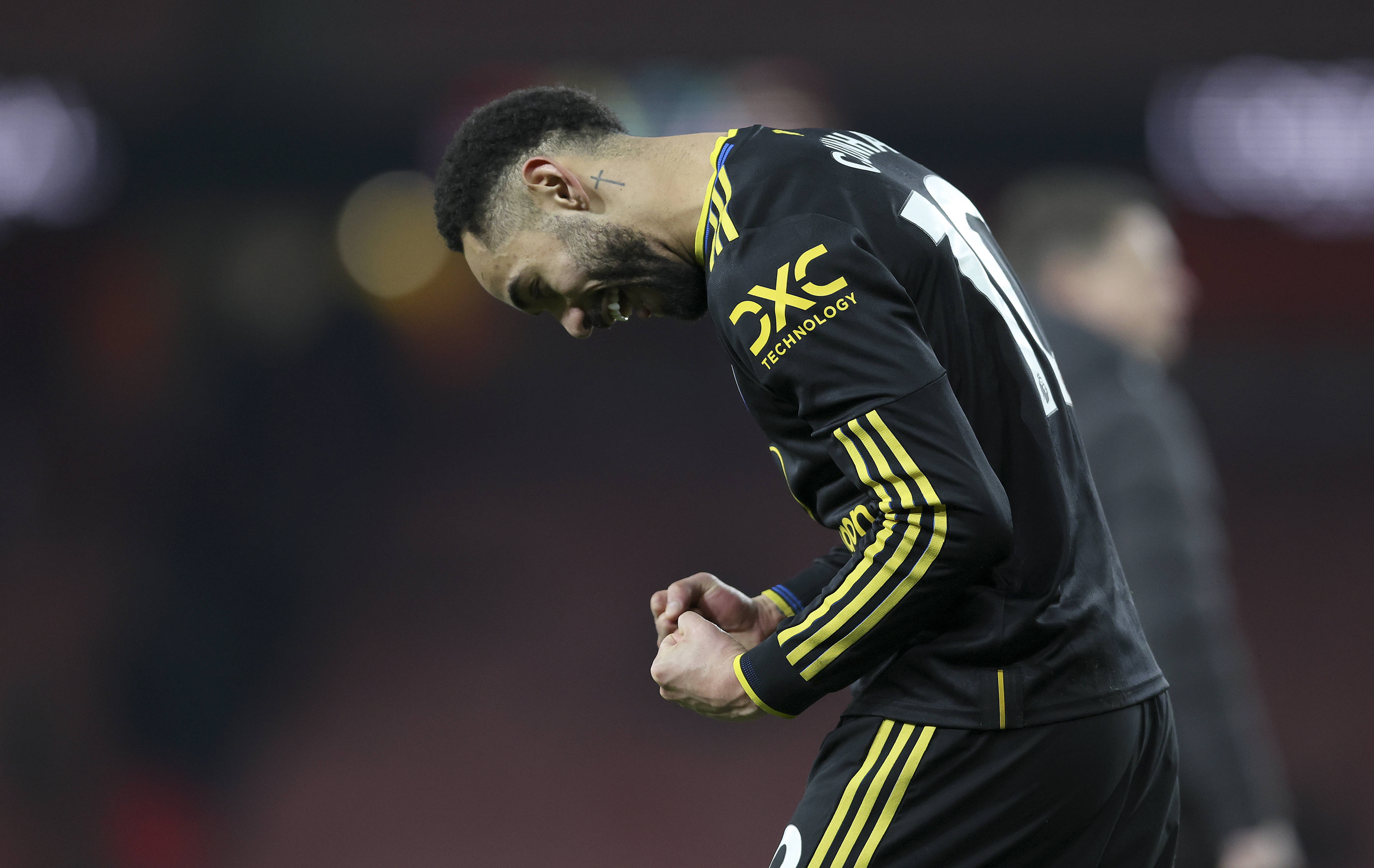 Matheus Cunha celebrates after winning the Premier League match between Arsenal and Manchester United