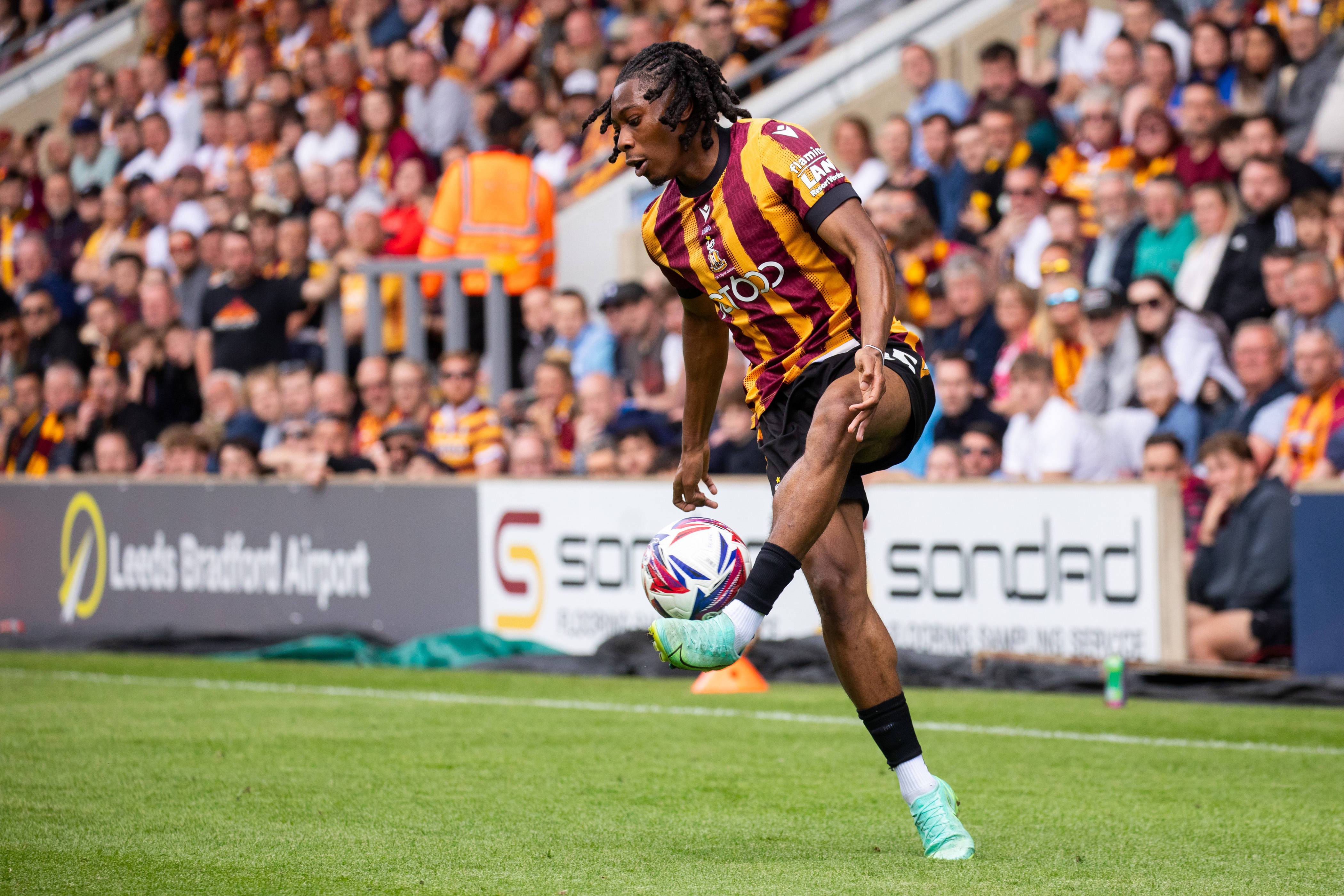 Tayo Adaramola in action during the SkyBet League Two game between Bradford City and Fleetwood Town