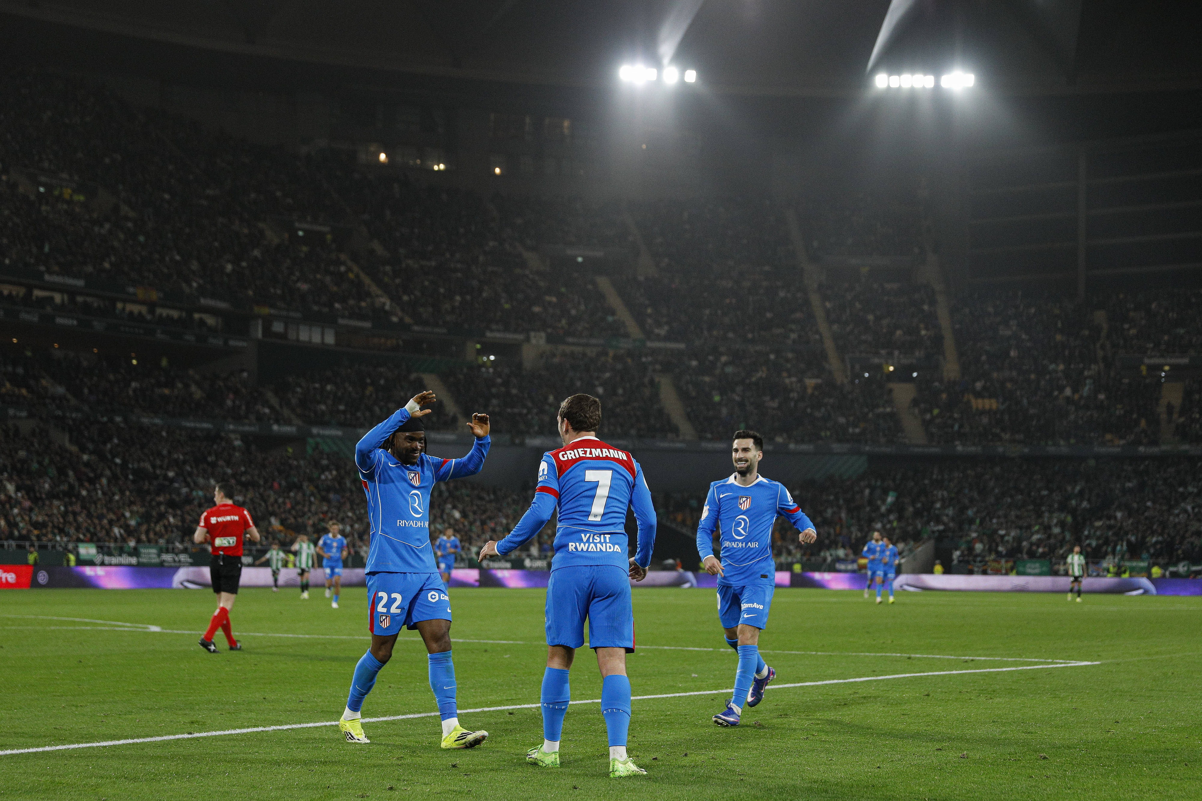 Griezmann celebrates with Ademola Lookman 