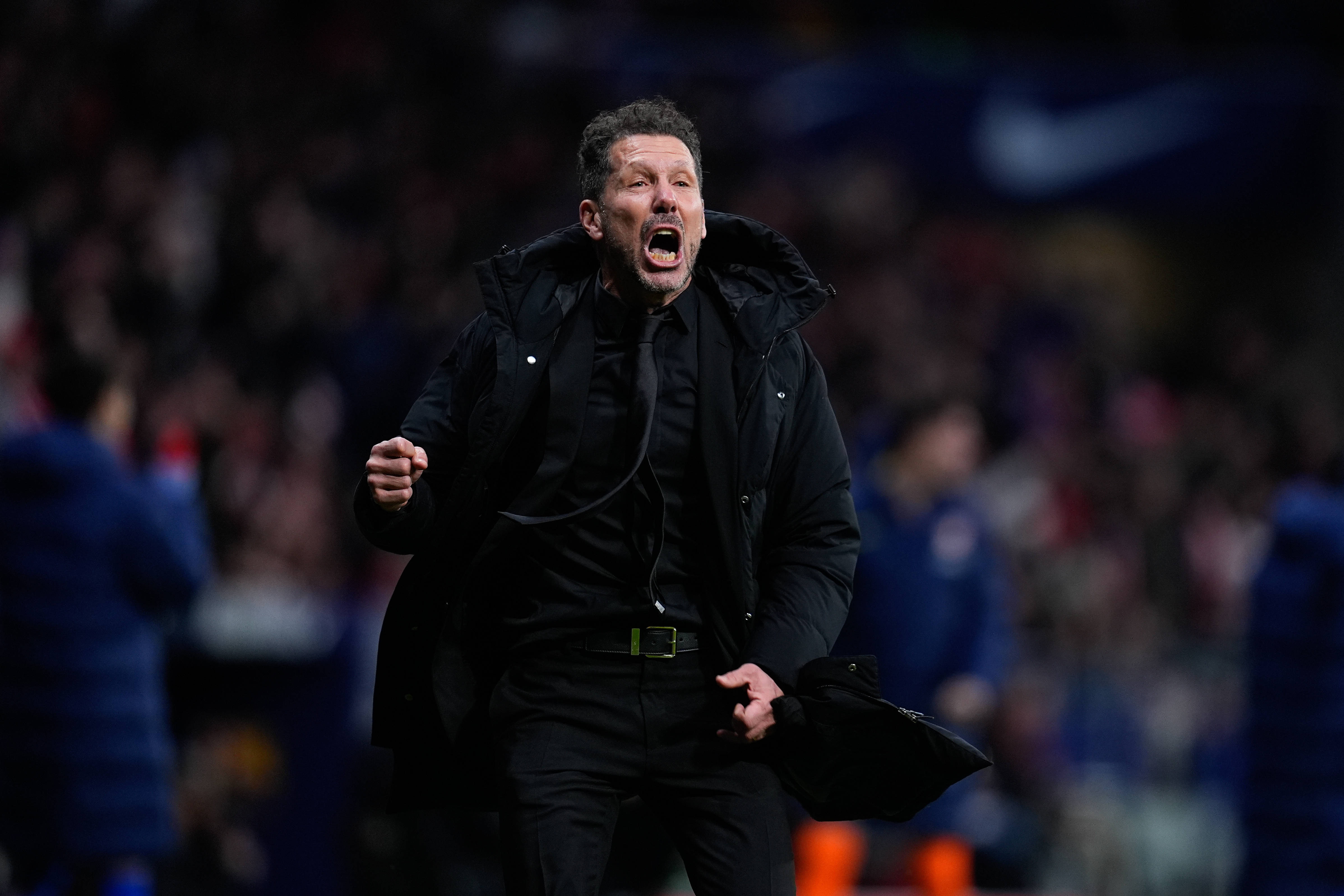 Diego Simeone, head coach of Atletico Madrid, celebrates a goal