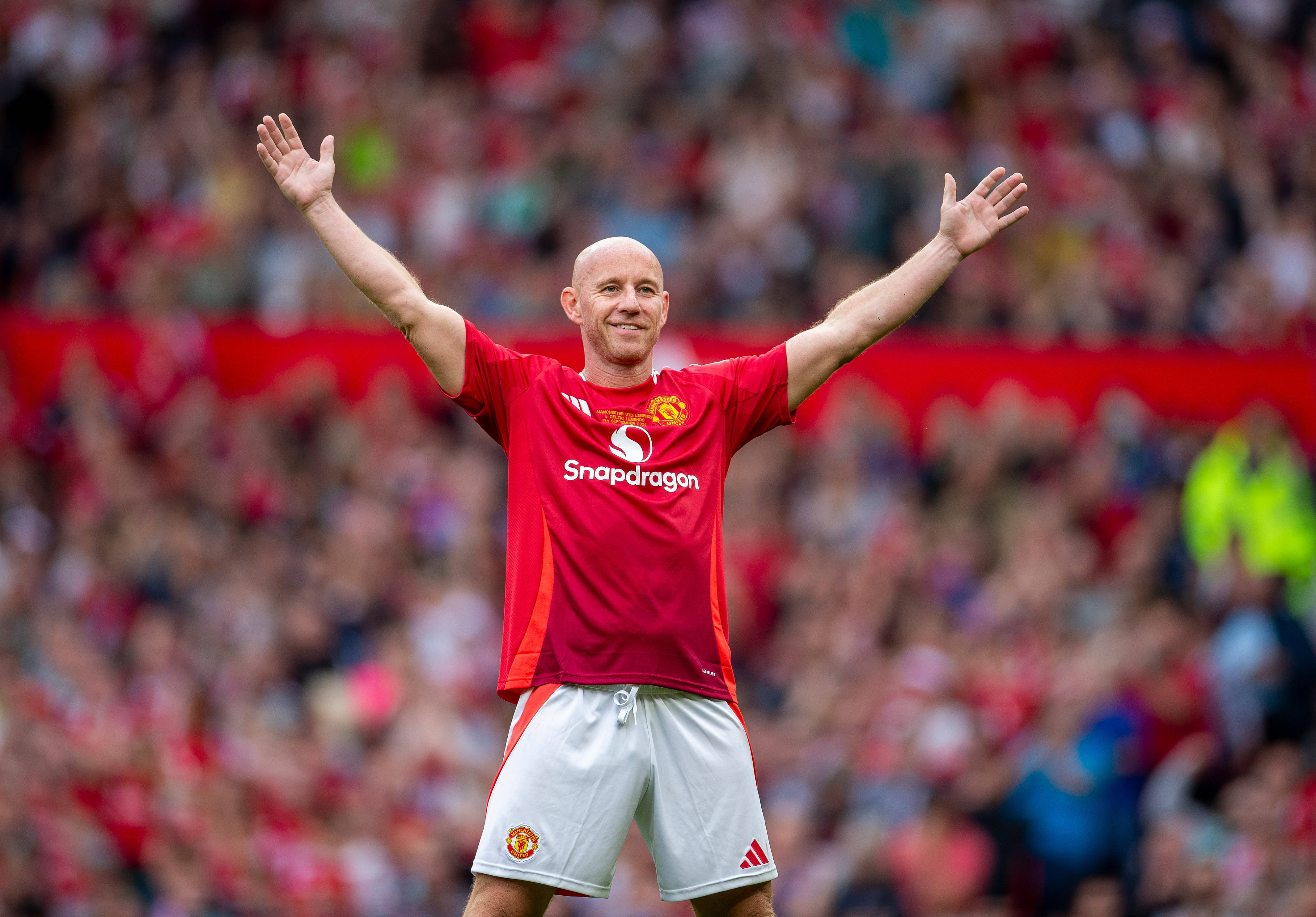 Nicky Butt of Manchester United celebrates towards the Celtic fans