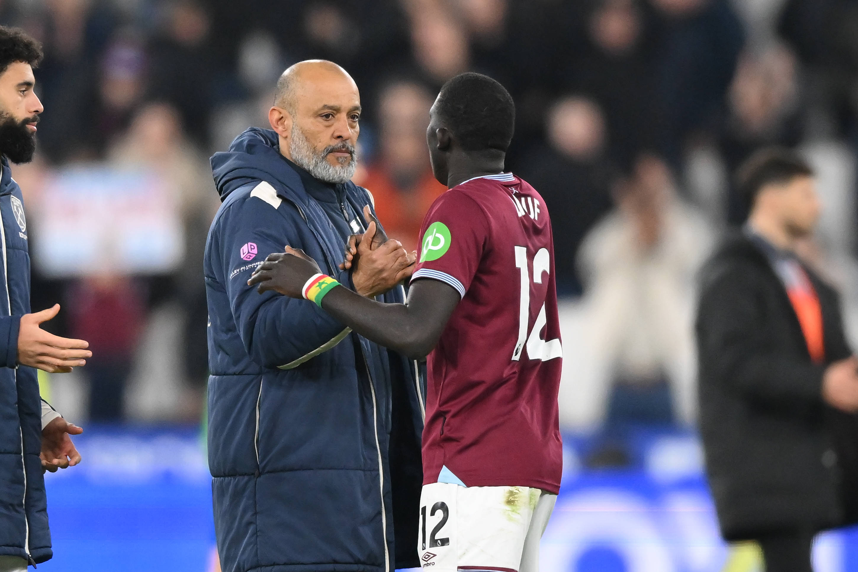 Nuno Espirito Santo with El Hadji Malick Diouf of West Ham United