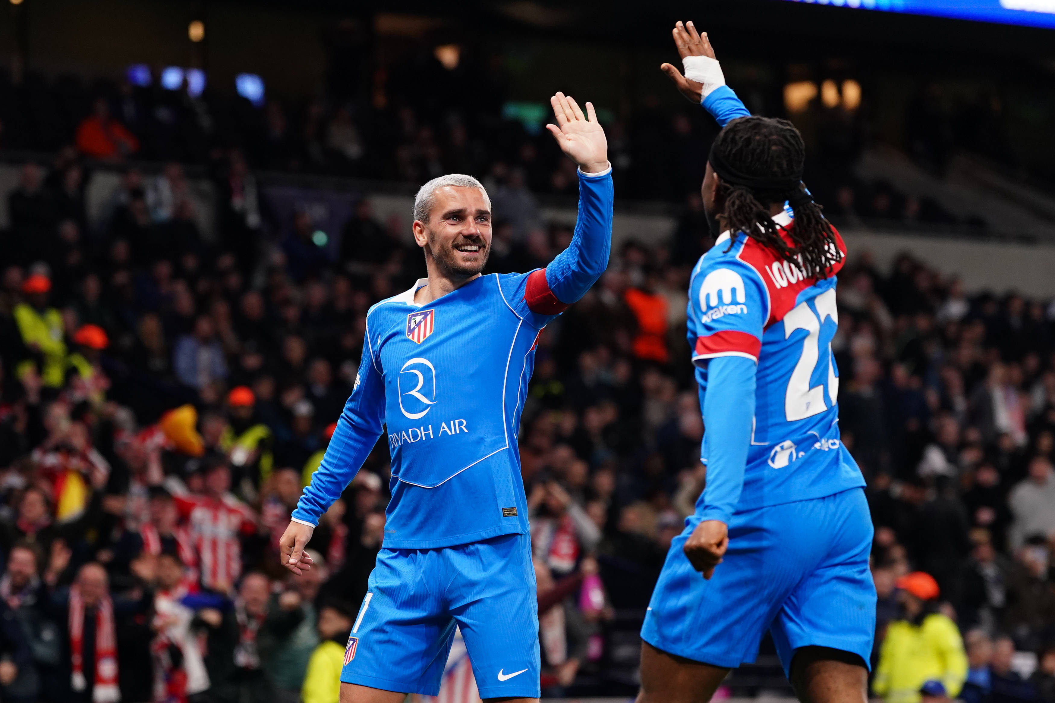 Ademola Lookman and Antoine Griezmann of Atletico Madrid celebrate.