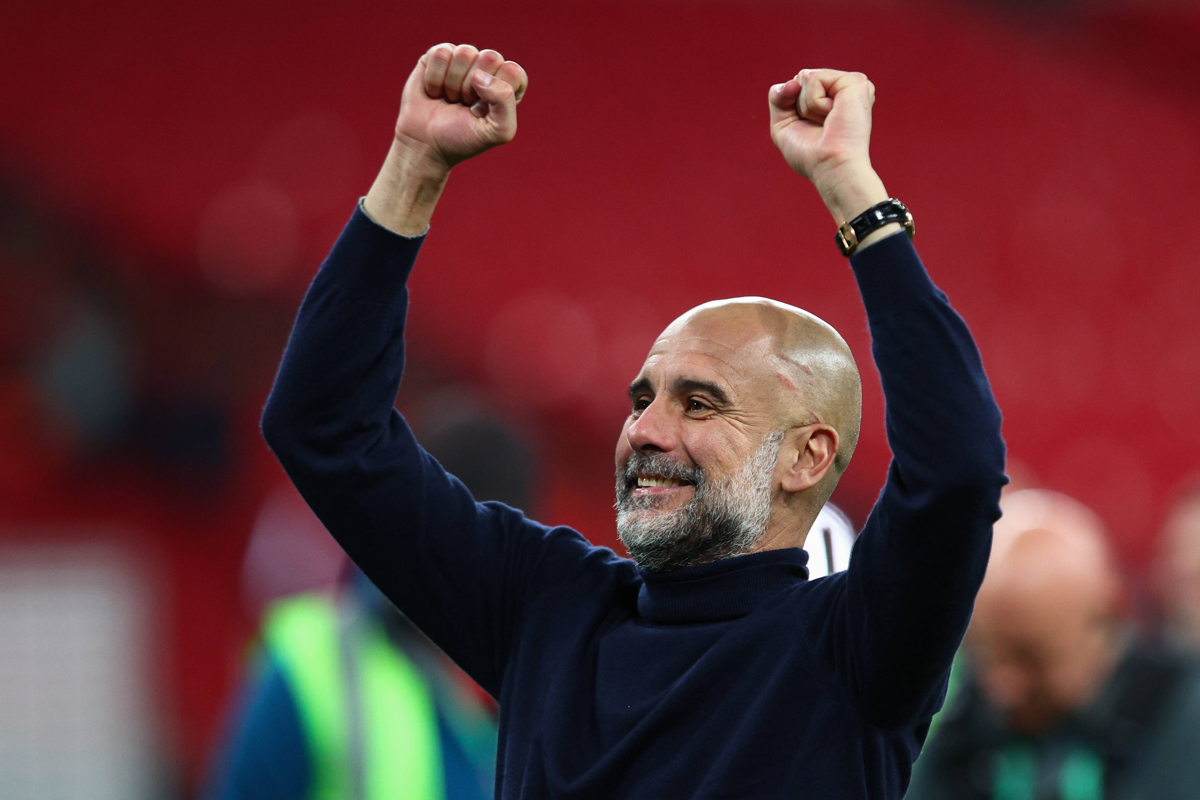 Manchester City manager Pep Guardiola celebrates after the Carabao Cup Final